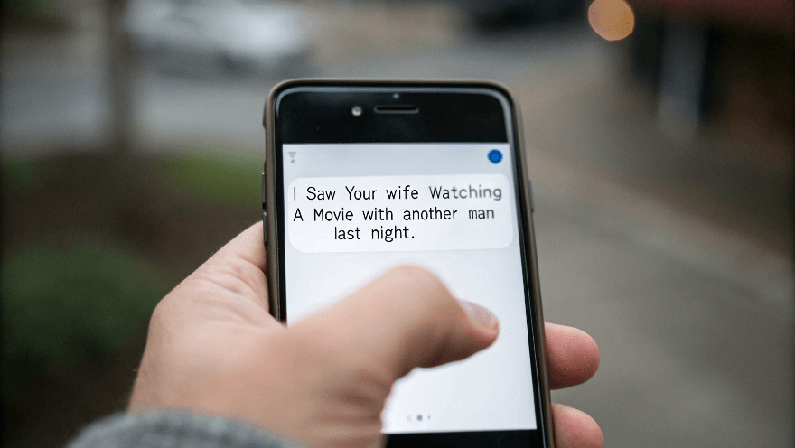 a text message about cheating alert appeared on the phone screen
